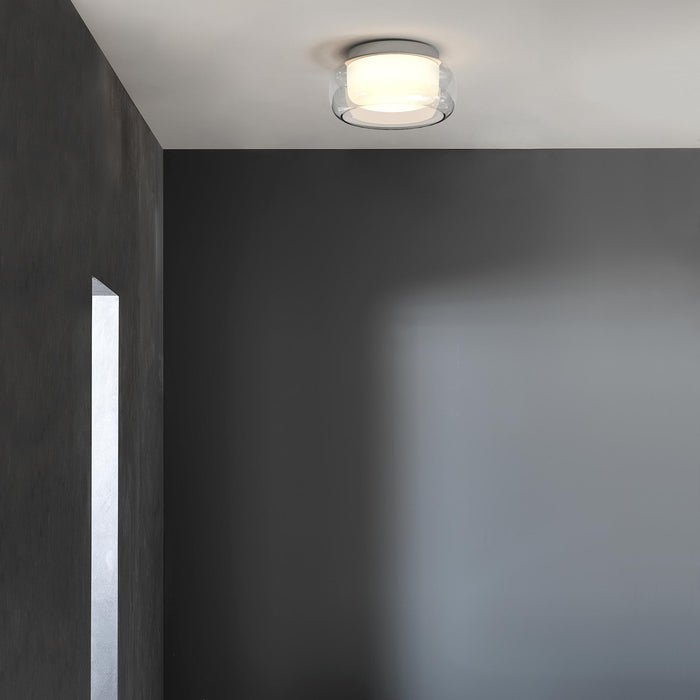 Aquina LED Semi Flush Mount Ceiling Light in bathroom.