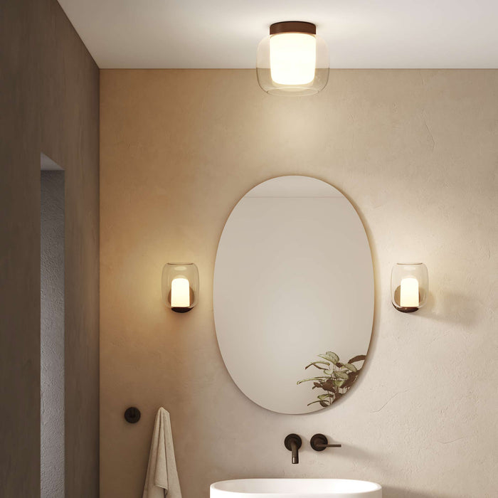Aquina LED Semi Flush Mount Ceiling Light in bathroom.