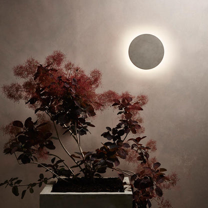 Eclipse Concrete LED Wall Light in living room.