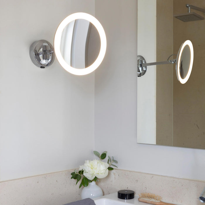 Mascali Round LED Magnifying Mirror in bathroom.