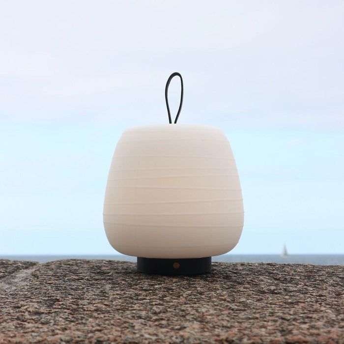Misko Camp LED Table Lamp in Outside Area.