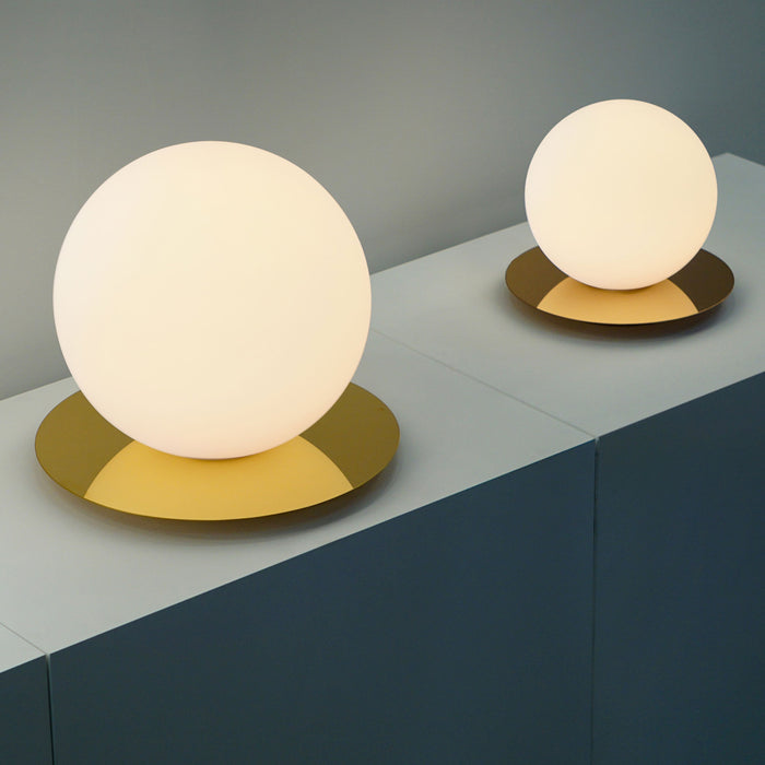 Bola Sphere LED Table Lamp in exhibition.