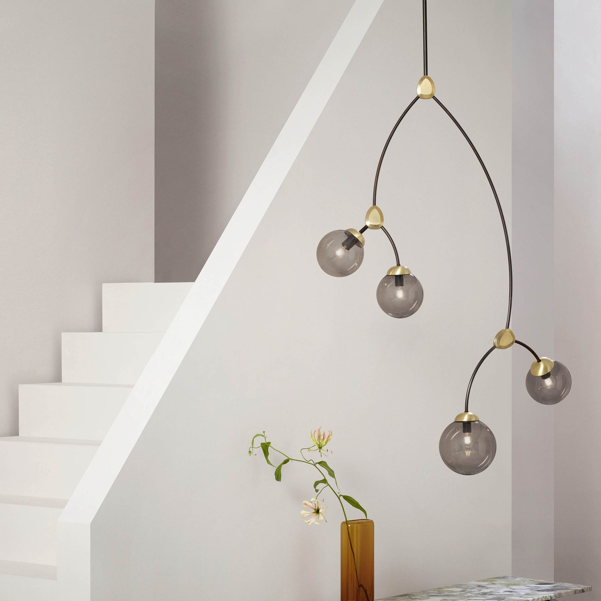 Ivy Vertical Pendant Light in stair.