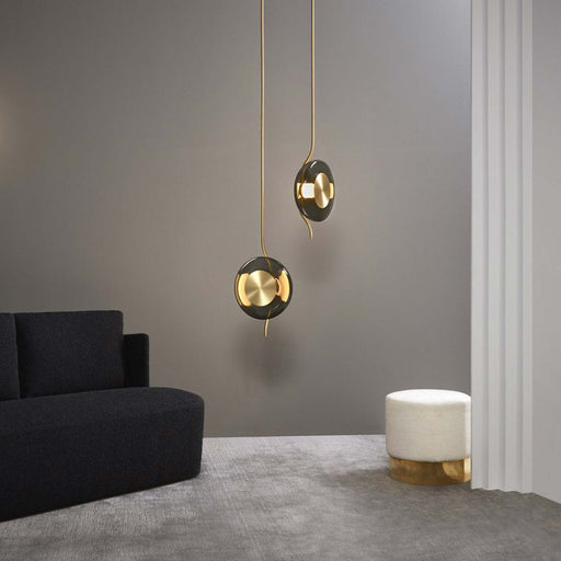 Pendulum LED Pendant Light in living room.