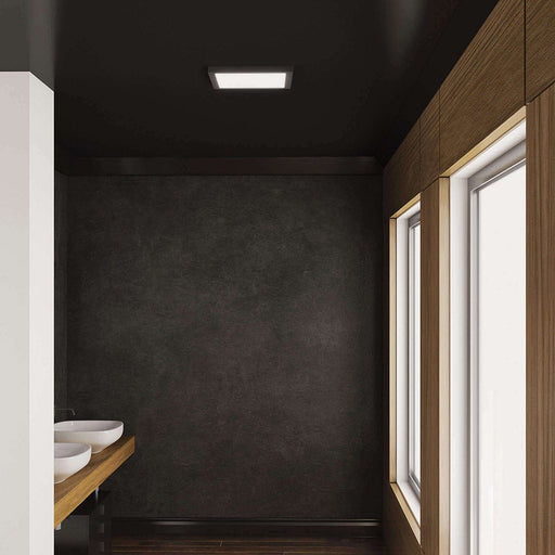 Delta Square Indoor/Outdoor LED Flush Mount Ceiling Light in bathroom.