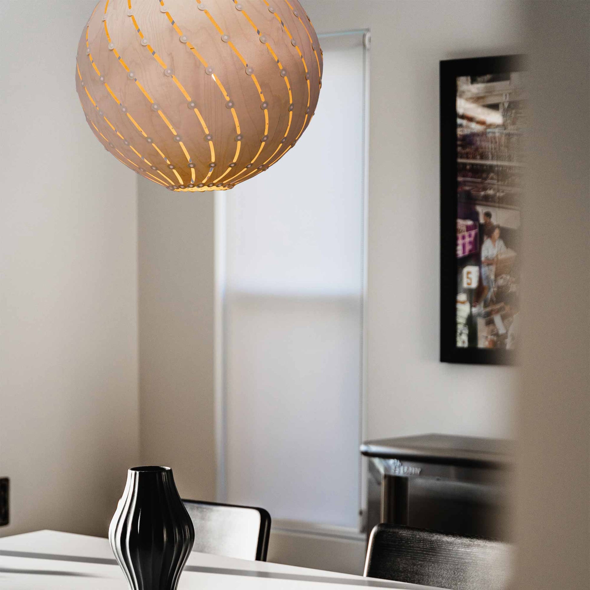 Ebb LED Bounce Pendant Light in dining room.