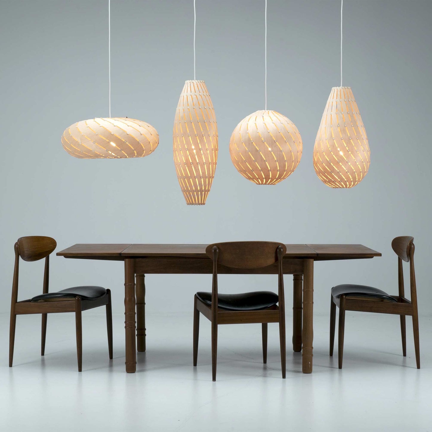 Ebb LED Bounce Pendant Light in dining room.