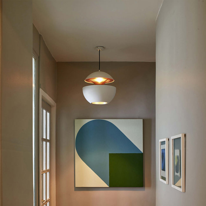 Here Comes the Sun LED Pendant Light in hallway.