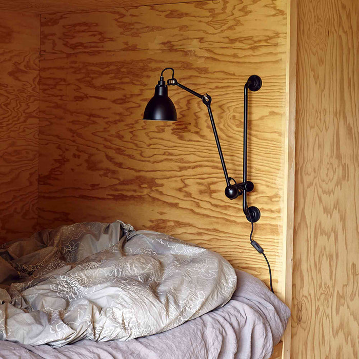 Lampe Gras N°210 Swing Arm LED Wall Light in bedroom.