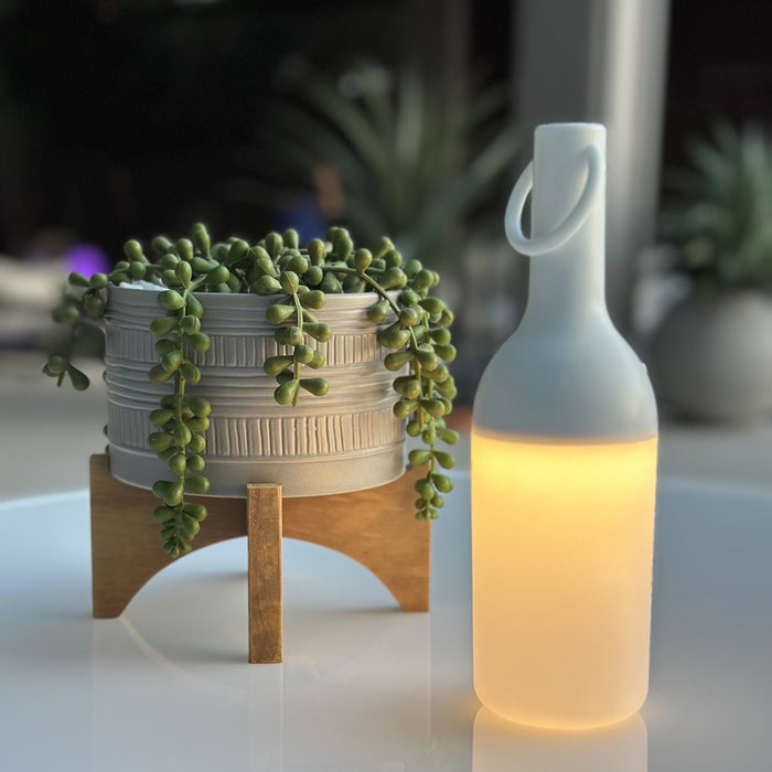 ELO Nomad Portable Outdoor LED Table Lamp in Outdoor area.