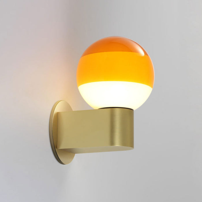 Dipping Light A1 LED Wall Light in Amber/Brushed Brass.