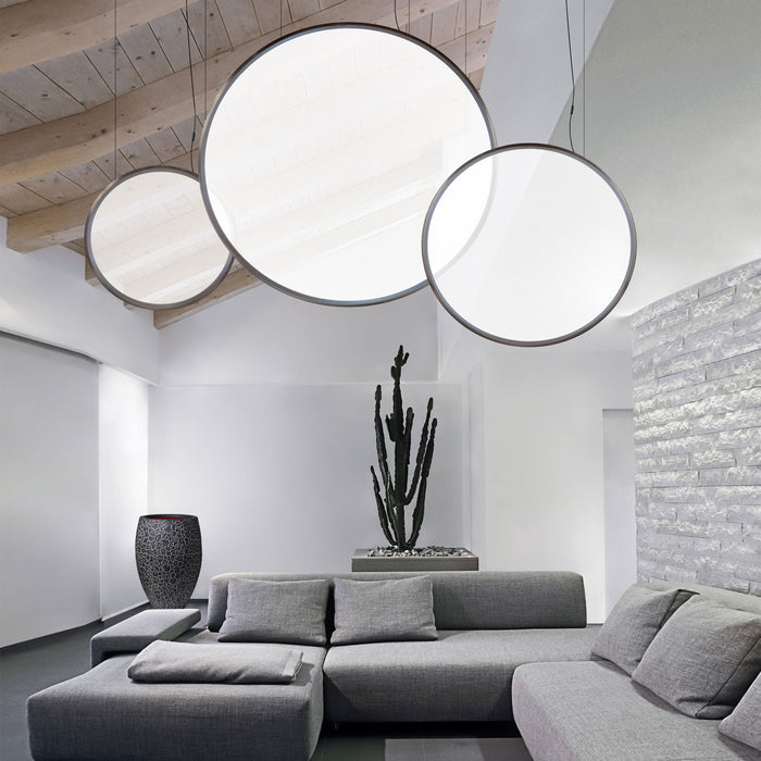 Discovery LED Vertical Suspension Light in living room.