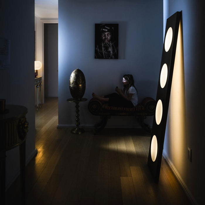 Dolmen LED Floor Lamp in living room.