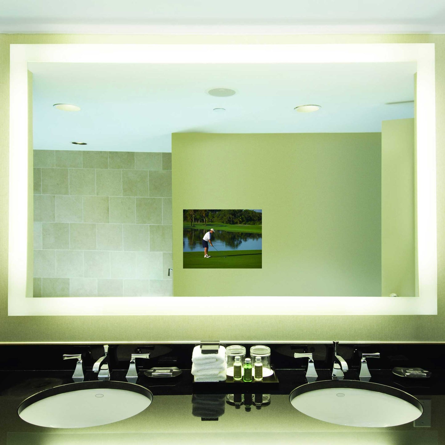 Silhouette LED Lighted Mirror TV in bathroom.