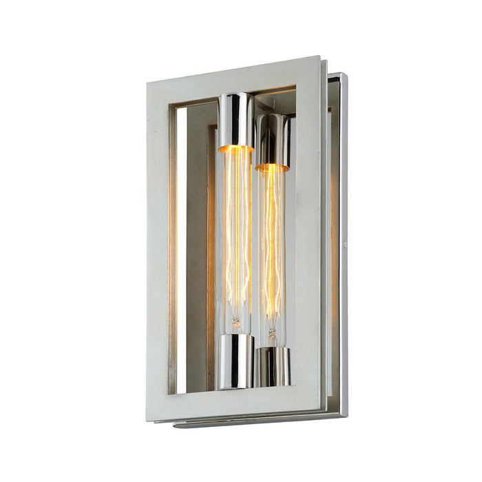 Enigma Wall Light in Silver Leaf with Stainless Accents.