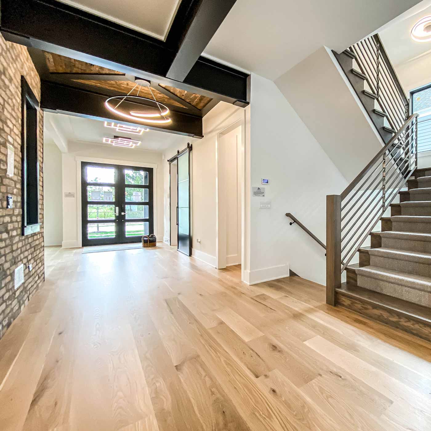 Cycle LED Pendant Light in hallway.