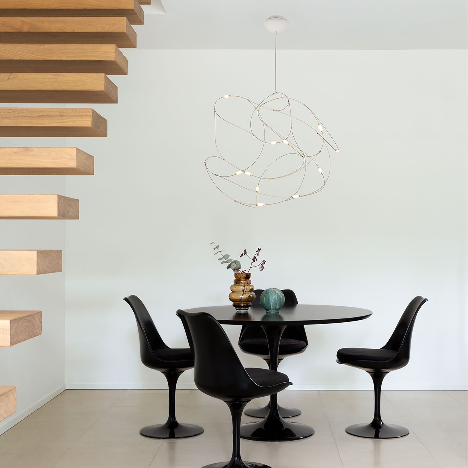 Flock of Light LED Chandelier in dining room.