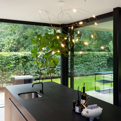 Flock of Light LED Chandelier in dining room.