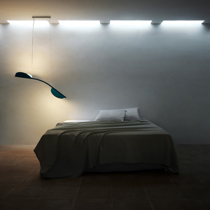 Almendra Arch LED Linear Pendant Light in bedroom.