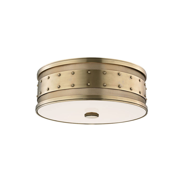 Gaines Flush Mount Ceiling Light in 3-Light/Aged Brass.
