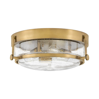 Harper Flush Mount Ceiling Light in Heritage Brass.