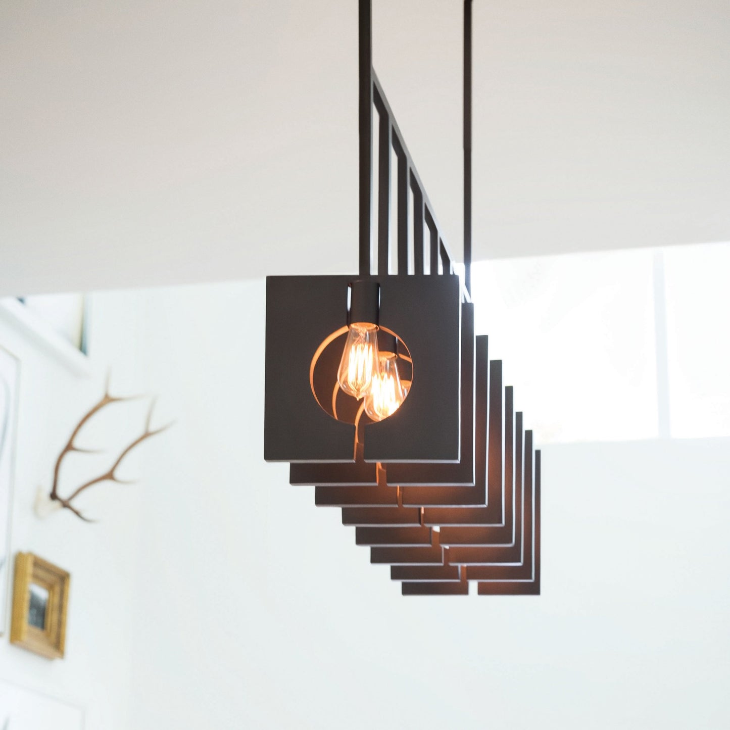 Ludlow Linear Pendant Light in living room.