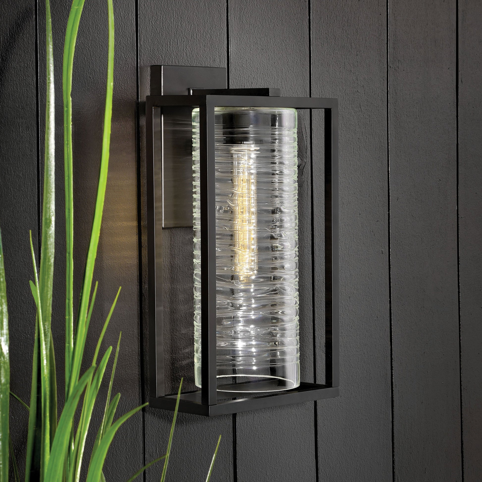 Pax Outdoor Wall Light in exhibition.