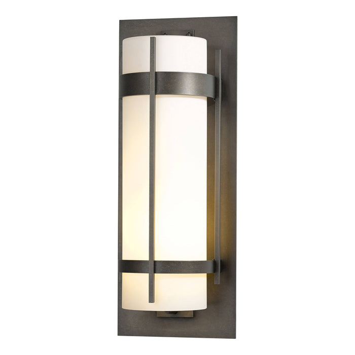 Banded Outdoor Wall Light in Small/Incandescent/Coastal Natural Iron/Opal Glass.