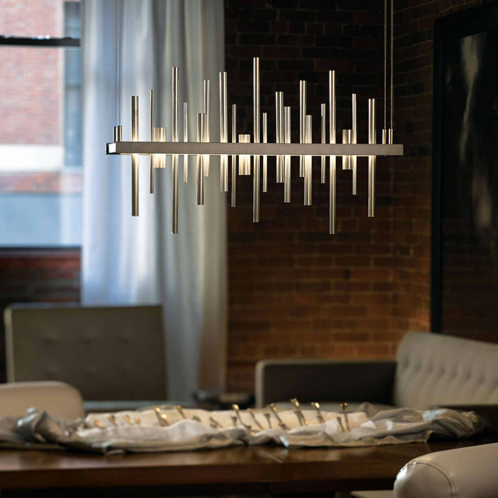 Cityscape LED Pendant Light in living room.