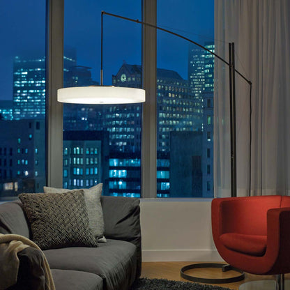 Disq Arc LED Floor Lamp in living room.