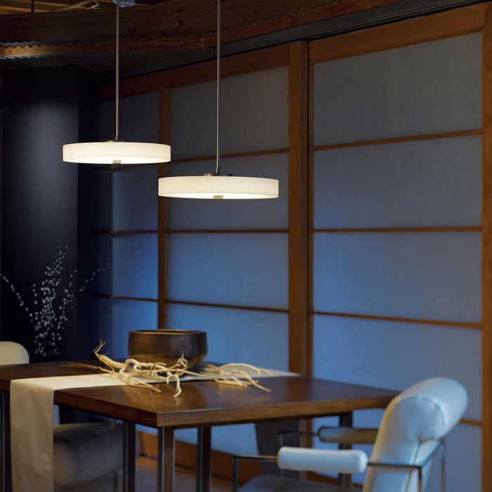 Disq LED Pendant Light in dining room.