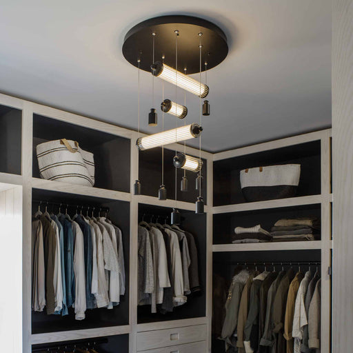 Libra LED Semi-Flush Mount Ceiling Light in dressing room.