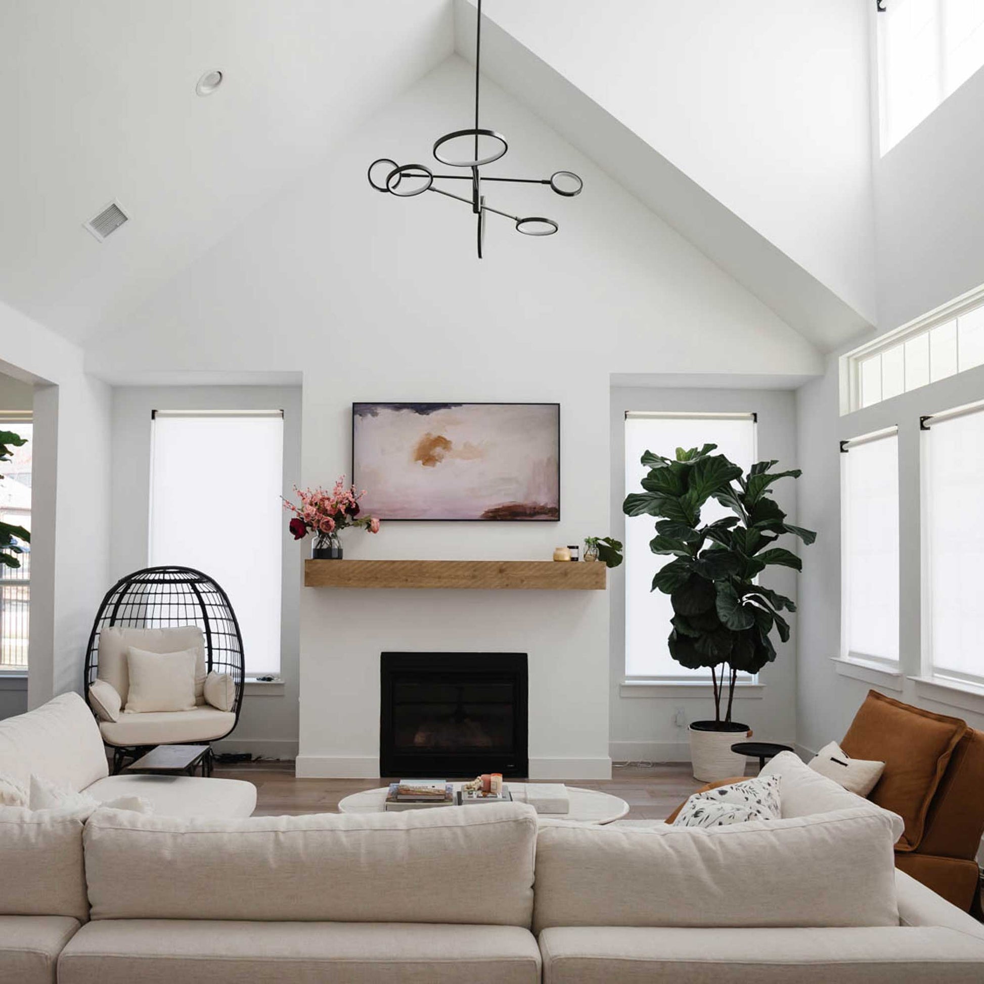 Saturn LED Chandelier in living room.