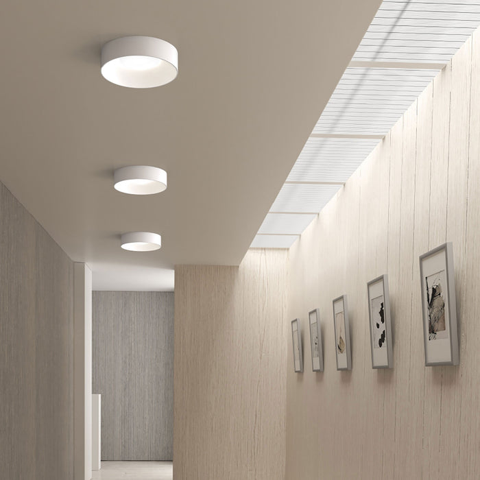 Ilios™ LED Flush Mount Ceiling Light in hallway.