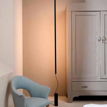 Cupido LED Floor Lamp in bedroom.