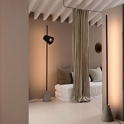 Cupido LED Floor Lamp in bedroom.