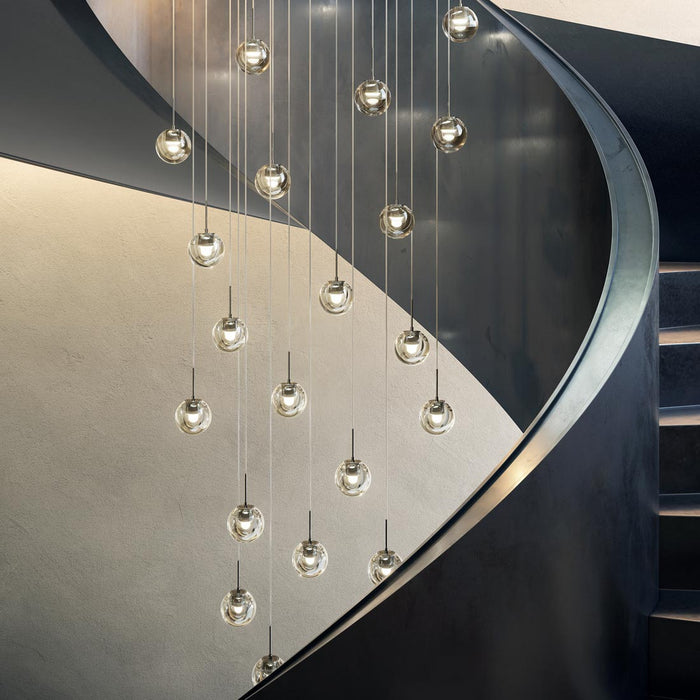 Dew LED Chandelier in stairs.