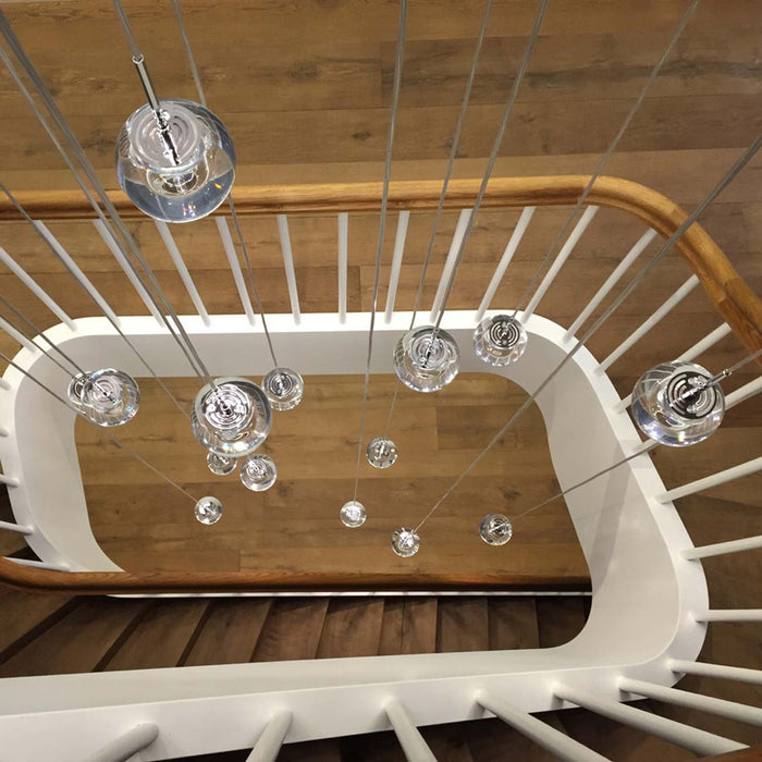 Dew LED Multi Light Pendant Light in stairs.