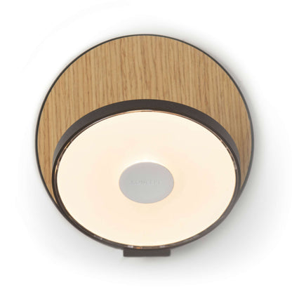 Gravy Hardwire LED Wall Light in Metallic Black and White Oak.