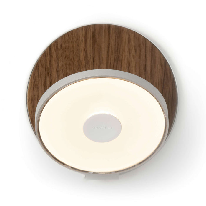 Gravy Hardwire LED Wall Light in Silver and Oiled Walnut.