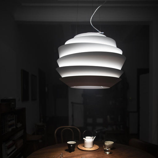Le Soleil Pendant Light in dining room.