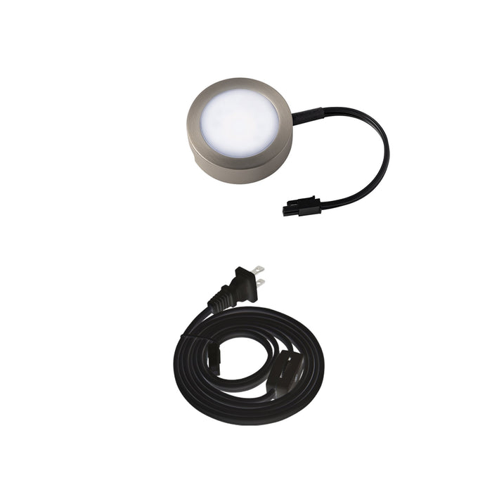 LED Puck Light with Single Lead Wire in Brushed Nickel.