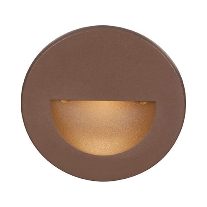LEDme Round LED Step and Wall Light in Amber/Bronze.