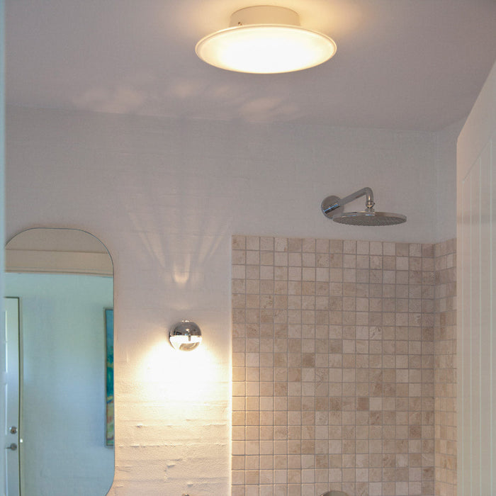 AJ Eklipta Wall Light in bathroom.