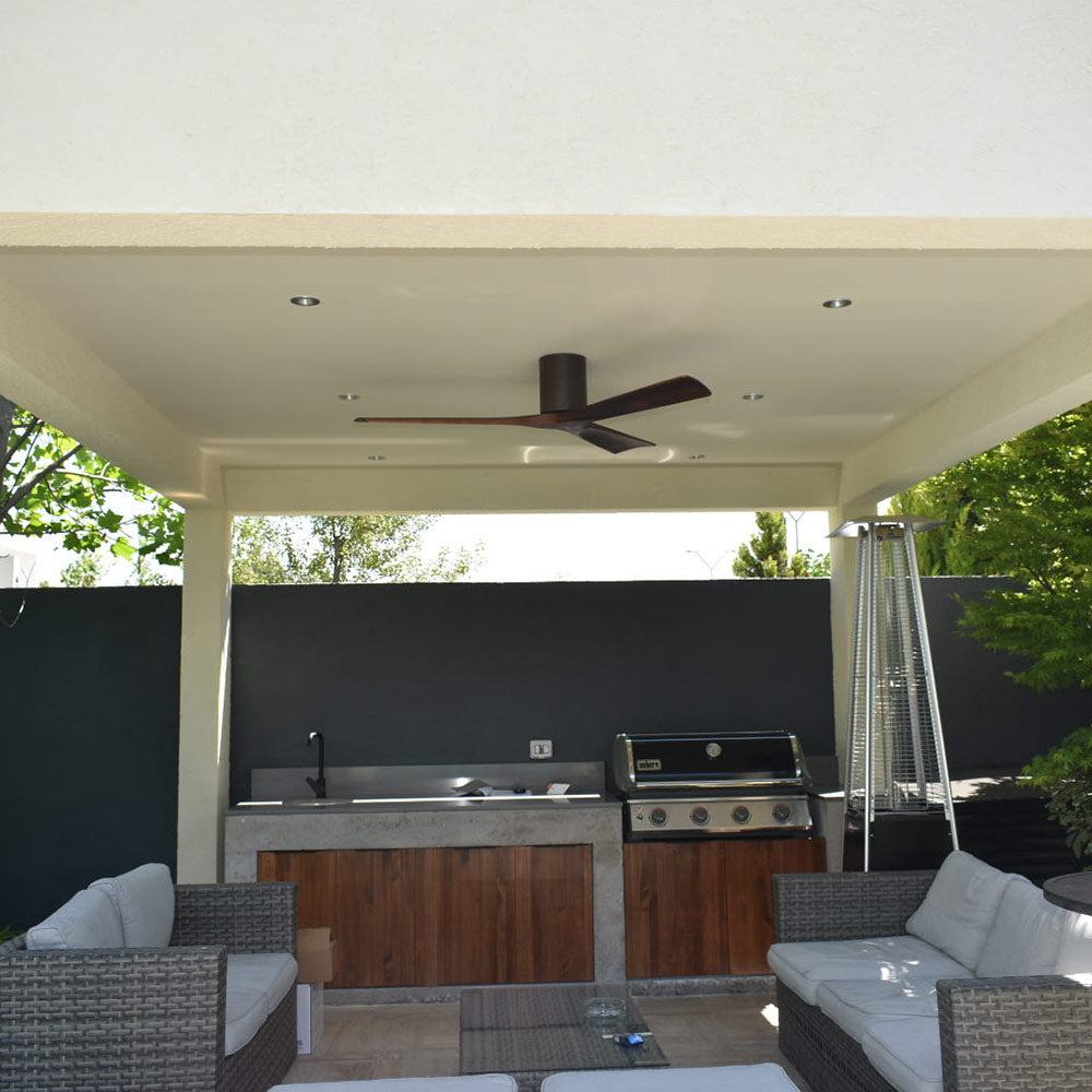 Irene IR3H Indoor / Outdoor Flush Mount Ceiling Fan in Outside Area.