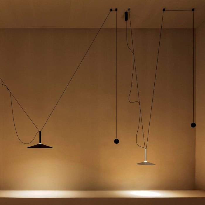 Milana Counterweight LED Pendant Light in living room.