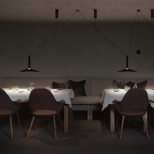 Milana Counterweight LED Pendant Light in dining room.