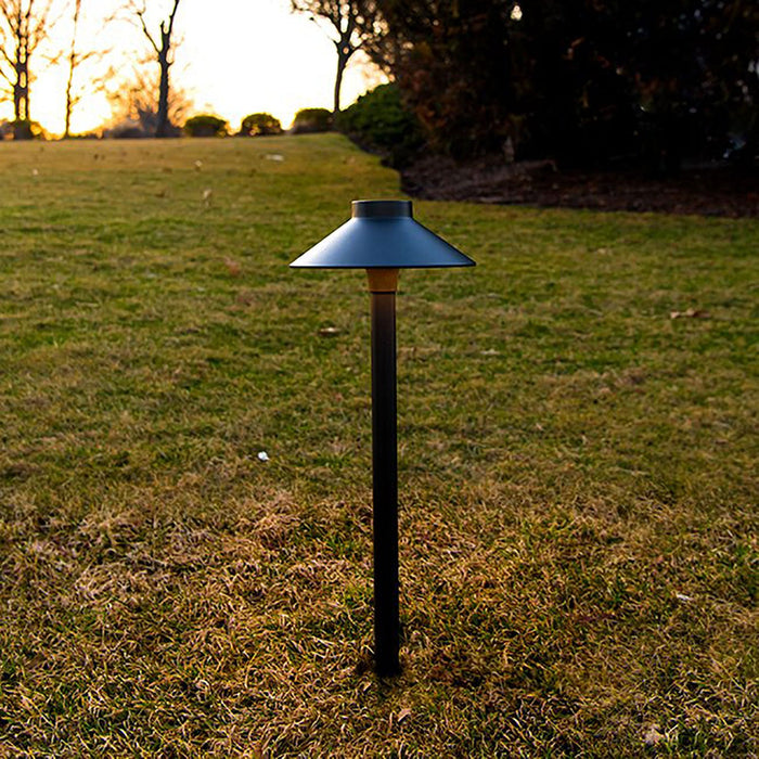 Mini Tiki LED Path Light in Outdoor Area.