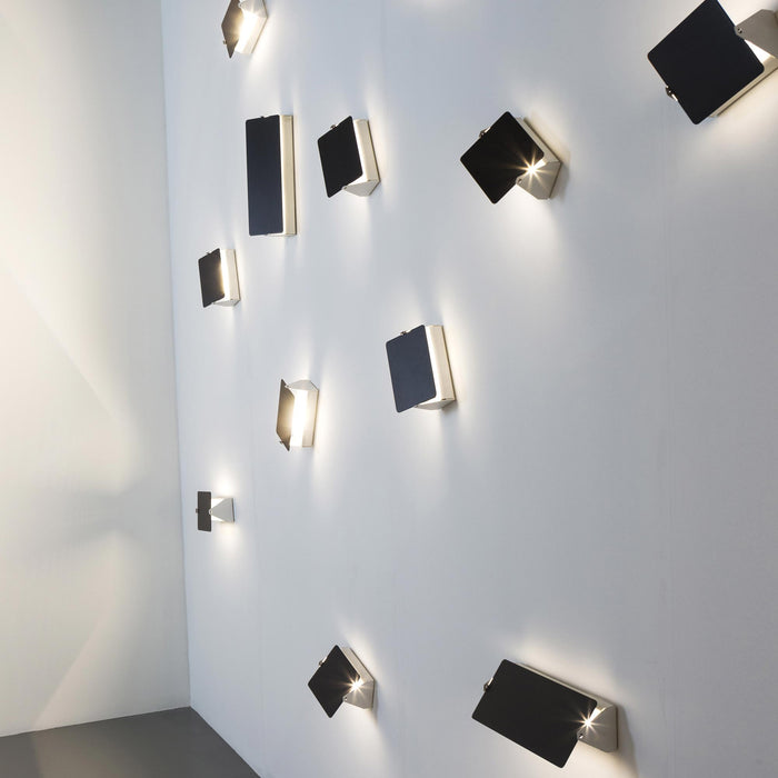 Applique A Volet Pivotant Wall Light in exhibition.