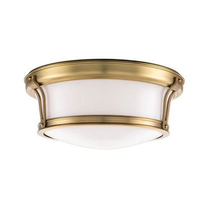 Newport Flush Mount Ceiling Light in Medium/Aged Brass.